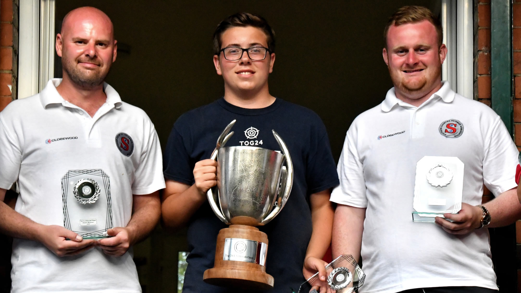 Stephen Daykin, Jamie Brooks and Callum Lombard lifting the trophy at the TOG24 La British Open